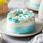 Whimsical blue and white vanilla cake